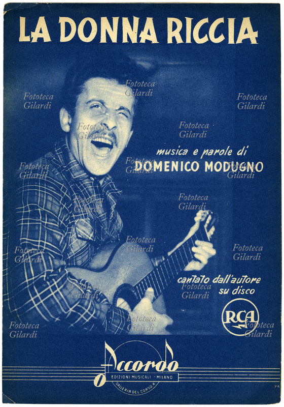 CANZONE Copertina dello spartito musicale di "La donna riccia", musica e parole di Domenico Modugno (9 gennaio 1928 – 6 agosto 1994), cantautore, chitarrista, attore, regista e in seguito uomo politico italiano. Incisa per RCA, Edizioni Musicali Accordo, Milano 1954