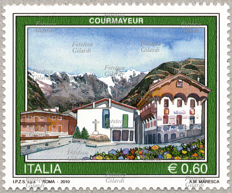 FRANCOBOLLO commemorativo della serie "Turistica" emessa dalle Poste italiane. Nella vignetta: Courmayeur, uno scorcio di Piazza Abbé Henry con le sue caratteristiche abitazioni e, alle sue spalle, il massiccio del Monte Bianco su cui svetta il Dente del Gigante. Disegno di Anna Maria Maresca, valore nominale 0,60 Euro, rotocalcografia cinque colori, carta fluorescente non filigranata, Officina Carte Valori dell\