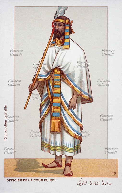 AIDA Stage Costume of a Pharaoh Court Officer; from opera by Giuseppe Verdi (1813-1901). From a series of 24 chromolitographs depicting all the costumes of the interpreters, derived from the figurines of the scaligero set up of 1873. Below the bilingual caption: French and Arabic. Genoa, circa 1906
