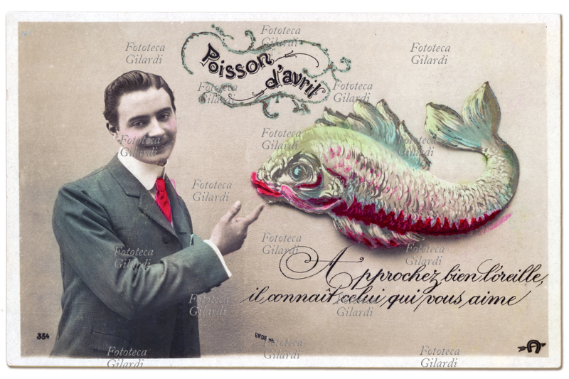 RICORRENZE Primo Aprile. Cartolina fotografica acquarellata. Francia, 1920 circa.