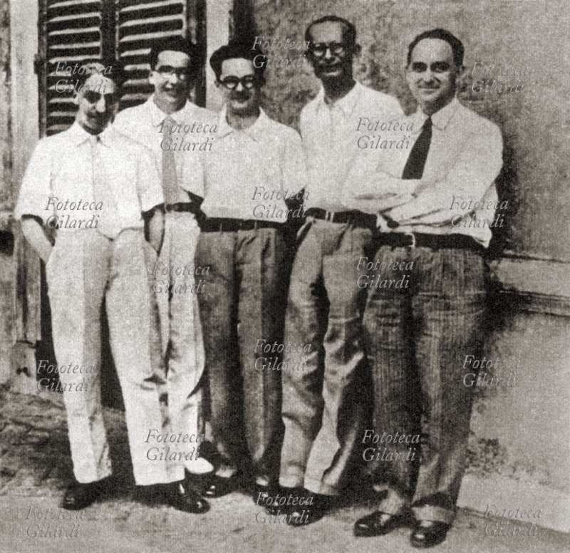 Italy 1934 Photography of group of Italian physicists. From right: Enrico Fermi, Franco Rasetti, Edoardo Amaldi, Emilio Segre, Oscar D\