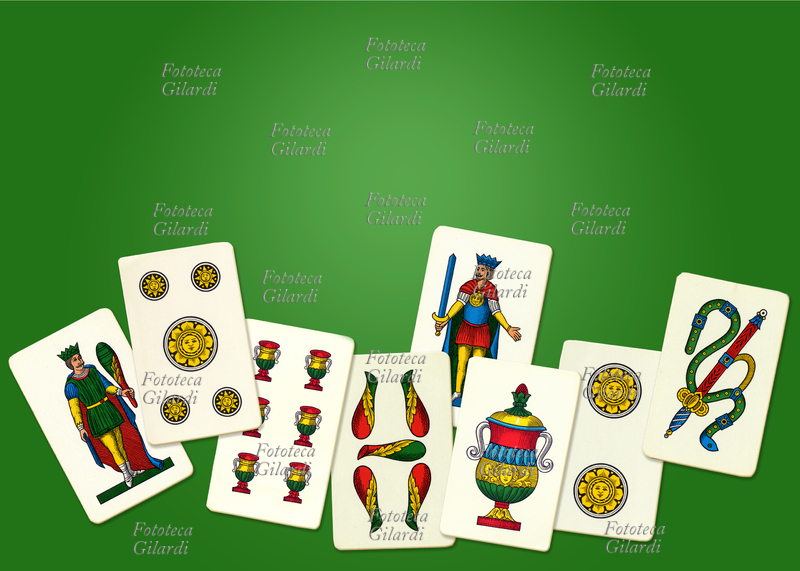 CARTE DA GIOCO NAPOLETANE re di bastoni, cinque di ori, sei di coppe, cinque di bastoni, re di spade, asso di coppe, due di ori, asso di spade. Napoli, 1980 circa.