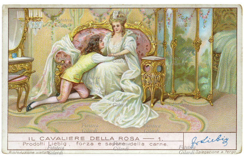 Richard STRAUSS (11 giugno 1864 – 8 settembre 1949) "Ottaviano dichiara il suo amore alla principessa", atto I da "Il cavaliere della rosa" (Der Rosenkavalier), commedia per musica in tre atti su libretto dello scrittore austriaco Hugo von Hofmannsthal, eseguita la prima volta il 26 gennaio 1911 alla Königliches Opernhaus di Dresda. Prodotti Liebig: forza e sapore della carne. Cromolitografia, figurina Liebig della serie "Il cavaliere della rosa", n. 1. Italia 1935
