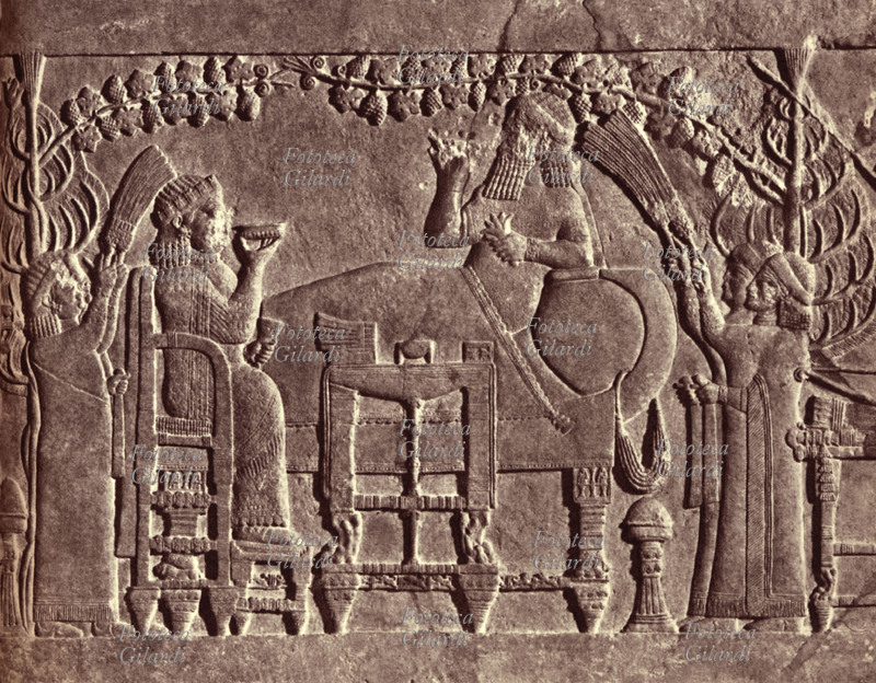 ASSYRIANS King Ashurbanipal (685 – 631 BC) reclining in his palace at Nineveh, toasting with his queen consort Libbali-sharrat (married 672 BC, died after 631 BC) the military victory in 653 BC over the kingdom of Elam. Bas-relief from the ruins of the Palace of Nineveh, 7th century BC