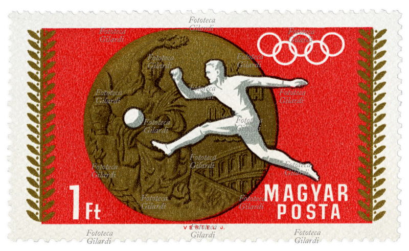 OLYMPICS Postage stamp from the "1968 Summer Olympic Games - Mexico City (II)" series issued by the Hungarian post office to commemorate the victories of national athletes. In the cartoon the gold medal at the Olympic soccer tournament. Drawing by József Vertel (January 2, 1922 - August 5, 1993), face value 1 forint, photogravure. Hungary, issued March 7, 1969