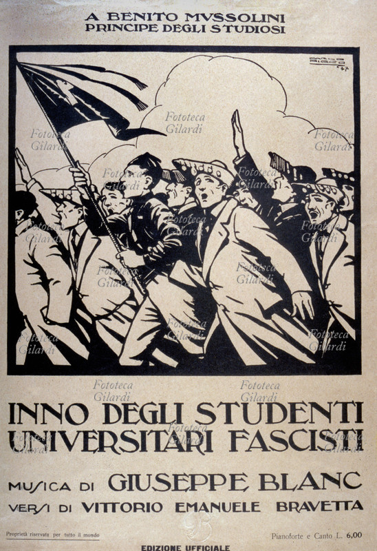 FASCISMO Inno degli studenti universitari fascisti. Copertina illustrata dello spartito. Musica di Giuseppe Blanc (11 aprile 1886 – 7 dicembre 1969), versi di Vittorio Emanuele Bravetta (1º dicembre 1889 – 24 dicembre 1965). La dedica in alto dice: A Benito Mussolini, principe degli studiosi. Italia, 1927
