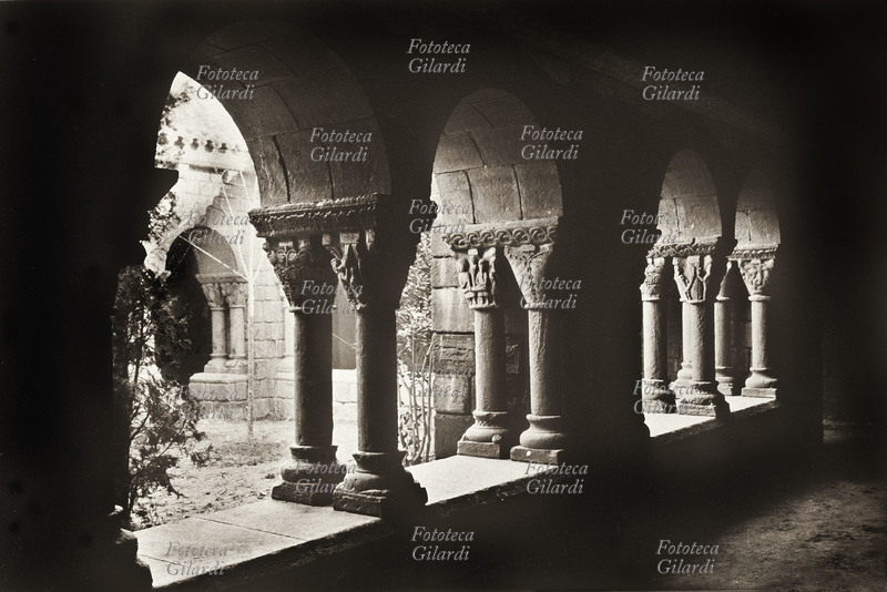 PUEBLO ESPAÑOL Cloister of the Romanesque Monastery. Pueblo illustrates the reconstruction of all the architectural styles present in Spain. Photograph taken on the occasion of the construction of Pueblo as a pavilion dedicated to Spanish Art and Craft, for the International Exhibition of Barcelona in 1929