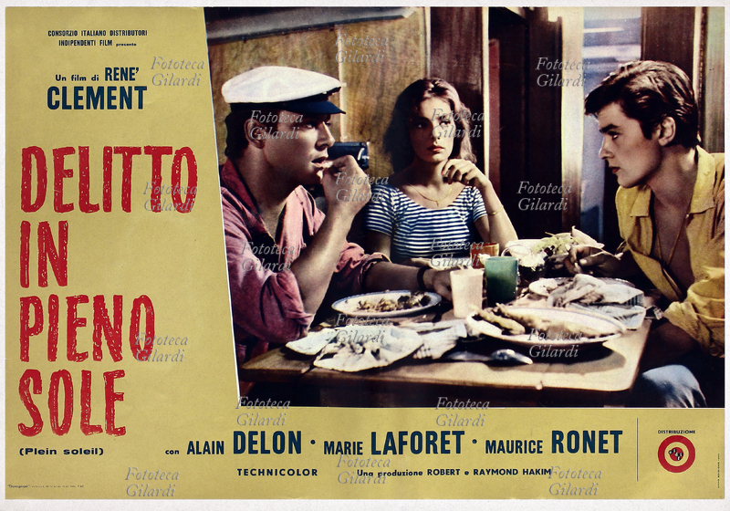 CINEMA Manifesto del film diretto da René Clément "Delitto in pieno sole" (Plein soleil) tratto dal romanzo "Il talento di mister Ripley" di Patricia Highsmith. I tre protagonisti Maurice Ronet, Marie Laforet e Alain Delon consumano un pasto frugale. Francia, 1960.
