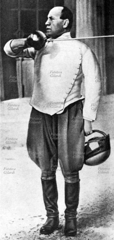MUSSOLINI swordsman. Picture of propaganda depicting Benito Mussolini held by fencer, 1930.