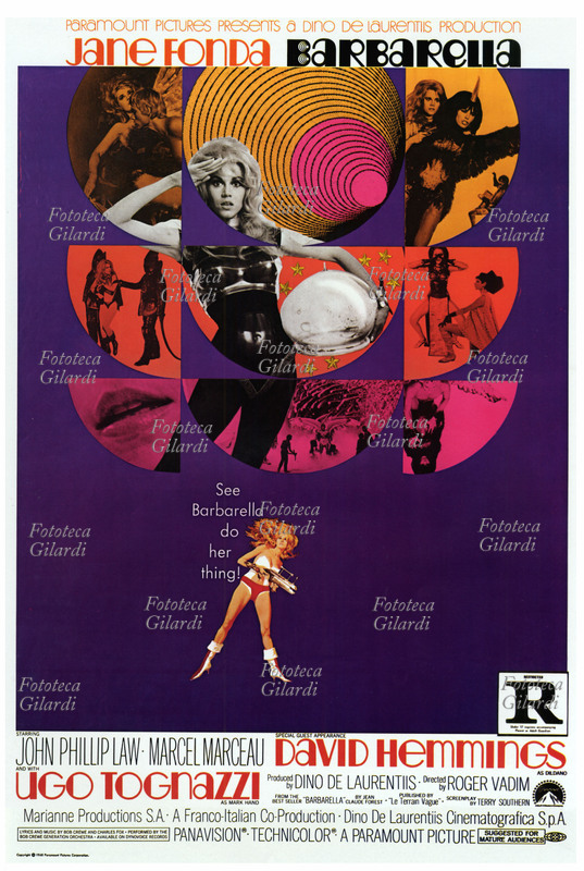 Jane FONDA (December 21, 1937), American actress and activist. Poster for the Italian-French film "Barbarella," directed by Frenchman Roger Vadim (January 26, 1928 – February 11, 2000), who co-wrote the screenplay with Jean-Claude Forest (September 11, 1930 – December 30, 1998), author of the comic book on which it is based. The actress also stars, among others, British actor David Hemmings (November 18, 1941 – December 3, 2003) and Italian actor Ugo Tognazzi (March 23, 1922 – October 27, 1990). Paramount Pictures, 1968.