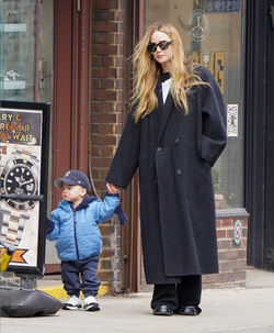 Magazine Features > Photo MGZ11399583: Jennifer Lawrence bundles up in black  maxi-coat while son Cy, one, wears a cute puffy blue jacket as they brave  NYC's chilly weather