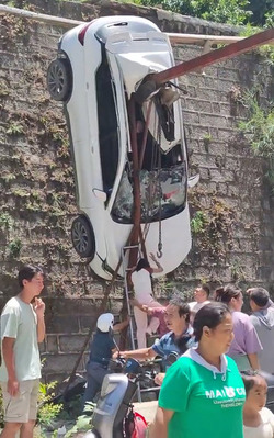 Woman Survives After Car Impaled On Massive Girder