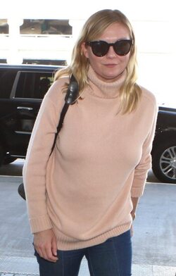 Kirsten Dunst arrives back at LAX Kirsten Dunst arrives back at LAX
