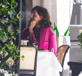 Trinny Woodall smokes outside at Scotts