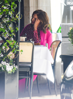 Trinny Woodall smokes outside at Scotts