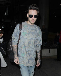 Liam Payne to miss Father s Day with his family as he arrives in LA for work