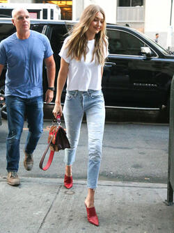 Gigi Hadid leaves her apartment in a plain white tee and red heels Gigi Hadid leaves her apartment in a plain white tee and red heels