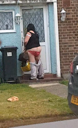 A bottomless woman was spotted stumbling into her house in broad daylight A bottomless woman was spotted stumbling into her house in broad daylight