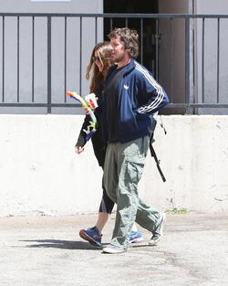 Christian Bale and his wife their their son out for breakfast
