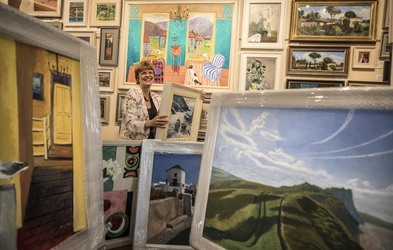 Sophie Miller of the Llewellyn Alexander gallery in Waterloo sifts through the approximately 600 works of art that has been rejected from the annual prestigious Royal Academy exhibition Sophie Miller of the Llewellyn Alexander gallery in Waterloo sifts through the approximately 600 works of art that has been rejected from the annual prestigious Royal Academy exhibition