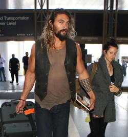 Jason Momoa Clutches His Favorite Pillow Going Through LAX TSA