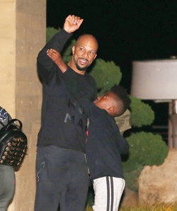 Common enjoys a night out with family at Soho