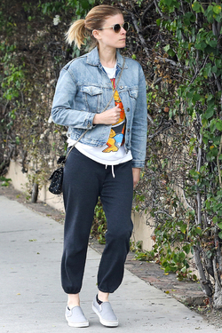 Kate Mara looks comfy in sweatpants and denim jacket while out and about