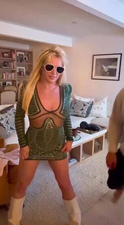 Britney Spears dances around in bed and gets licked by man Britney Spears dances around in bed and gets licked by man