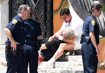 Ricky Martin and Edgar Ramirez act out the bloody death scene on the steps of the Versace Mansion during filming of Versace American Crime Story Ricky Martin and Edgar Ramirez act out the bloody death scene on the steps of the Versace Mansion during filming of Versace American Crime Story
