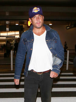 Comedic actor Will Arnett arrives at LAX sporting a cool denim jacket facial scruff and a Lakers cap as he makes his way to his vehicle. Comedic actor Will Arnett arrives at LAX sporting a cool denim jacket facial scruff and a Lakers cap as he makes his way to his vehicle.