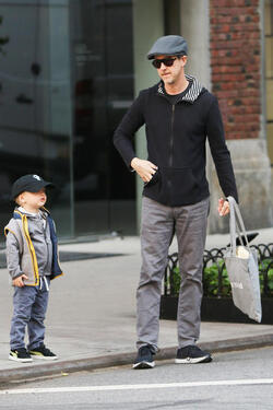 Edward Norton with son hails a taxi in New York City Edward Norton with son hails a taxi in New York City