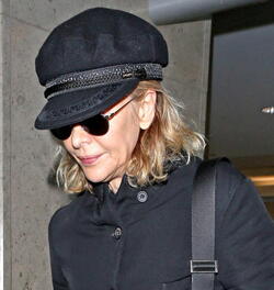 Meg Ryan Tries To Keep A Low Profile Arriving In L.A. After CFDA Awards