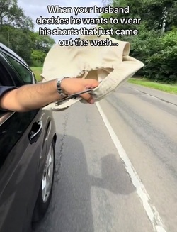 Time strapped Brit leaves drivers cackling hanging SHORTS out car window in quick dry hack