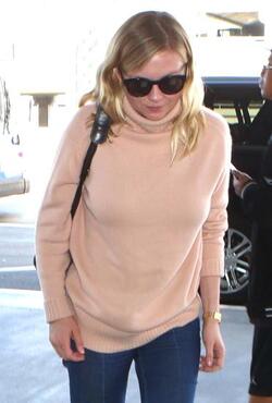 Kirsten Dunst arrives back at LAX Kirsten Dunst arrives back at LAX