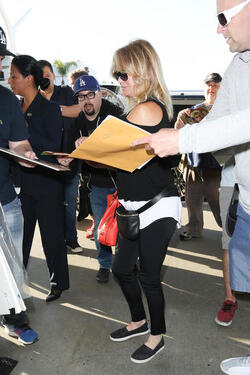Kurt Russell and Goldie Hawn are seen at LAX Kurt Russell and Goldie Hawn are seen at LAX