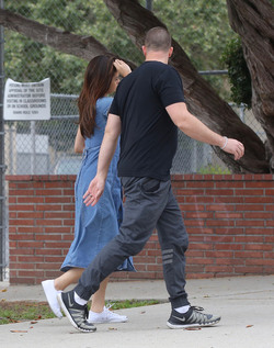 Selena Gomez Greeted by a fan While out With Bodyguard