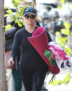 Reese Witherspoon attends her morning yoga session before taking a jog with a girlfriend in Brentwood.