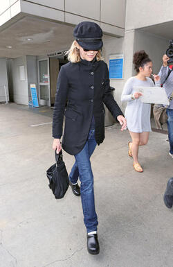 Meg Ryan Tries To Keep A Low Profile Arriving In L.A. After CFDA Awards