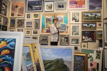 Sophie Miller of the Llewellyn Alexander gallery in Waterloo sifts through the approximately 600 works of art that has been rejected from the annual prestigious Royal Academy exhibition Sophie Miller of the Llewellyn Alexander gallery in Waterloo sifts through the approximately 600 works of art that has been rejected from the annual prestigious Royal Academy exhibition