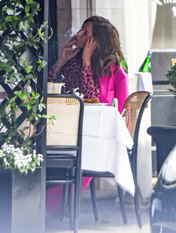 Trinny Woodall smokes outside at Scotts