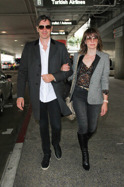 Milla Jovovich and Paul Anderson pictured at Los Angeles International Airport Milla Jovovich and Paul Anderson pictured at Los Angeles International Airport