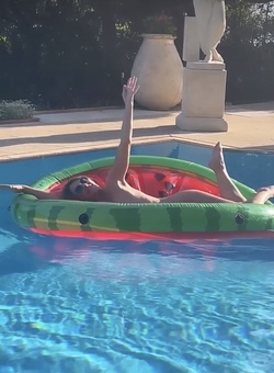 Liz Hurley poses totally nude on a slice of watermelon Liz Hurley poses totally nude on a slice of watermelon