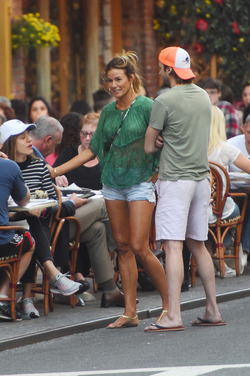 Kelly Bensimon pushing her Citi Biki and going for lunch in short shorts