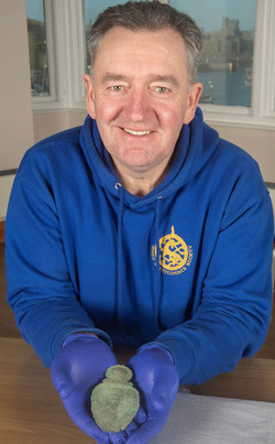 Baffled metal detectorist finds 2 000 year old spoon used to tell the future 