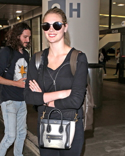 Kate Upton Goes Casual In All Black At LAX