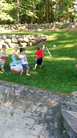 KID THROWS WATER BALLOON KID THROWS WATER BALLOON