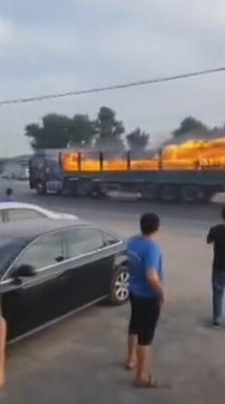 Moment Hero Driver Speeds Out Of Town In Burning Lorry
 video available 