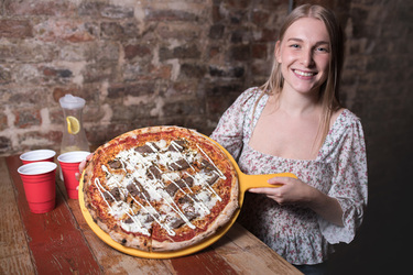 A LOT OF CHEDDAR NEW 2 500 CALORIE PIZZA IS TOPPED WITH 24K GOLD