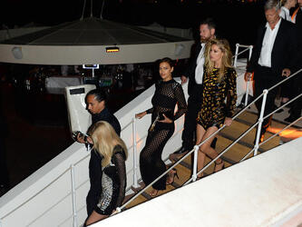 Lara Stone Doutzen Kroes and Irina Shayk leave yacht after L Oreal party in Cannes