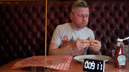 Foodie Smashes Record For Huge Burger Tower Challenge Foodie Smashes Record For Huge Burger Tower Challenge